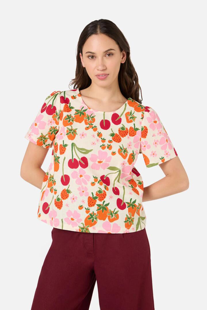 Image of a model wearing Tops. Productname: Berries N Cream Top in Cream colour by brand - Princess Highway