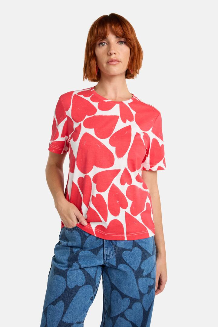 Image of a model wearing Tops. Productname: Heartbeat Print Classic Tee in Red colour by brand - Gorman