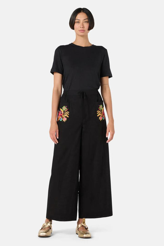 Image of a model wearing Pants. Productname: Papaya Patch Pant in Black colour by brand - Gorman