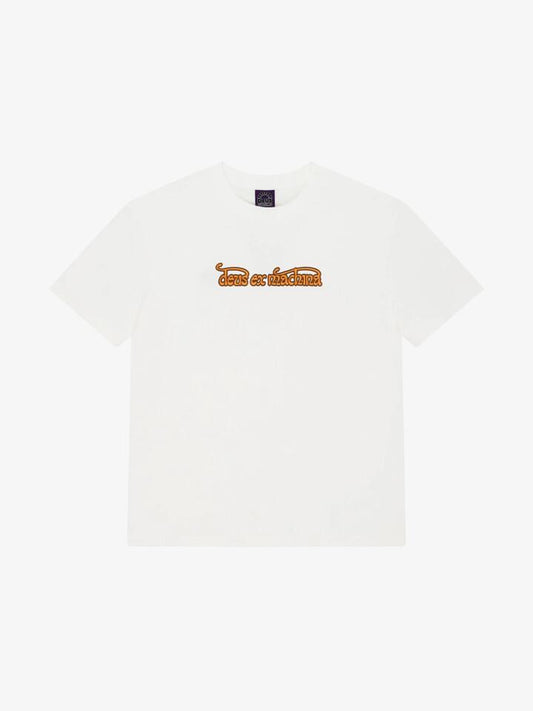 Image of a model wearing Tops. Productname: Deus Virtual Insanity Tee in Vintage White colour by brand - Deus