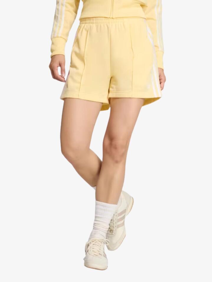 Image of a model wearing Shorts. Productname: Adidas Firebird Shorts in Orange Tint/Off White colour by brand - Adidas