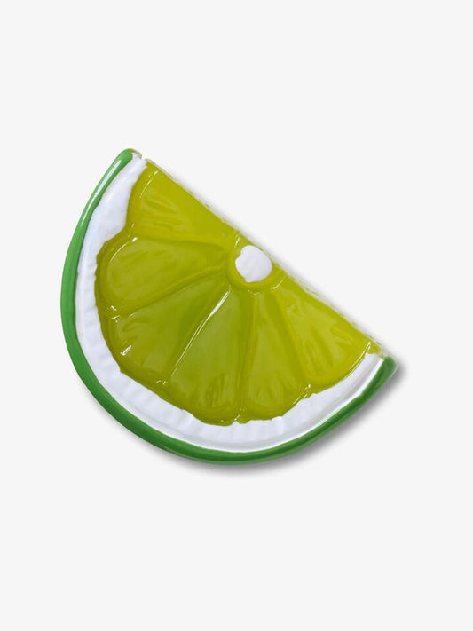 Image of Charms. Productname: Jibbitz Shiny Lime Slice Shoe Charm ONE SIZE Multi in Multi colour by brand - Jibbitz