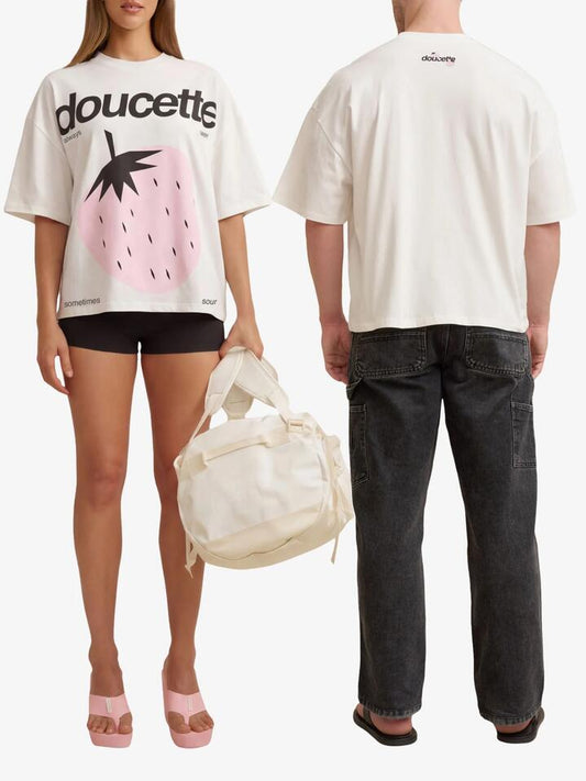 Image of a model wearing Tops. Productname: Doucette Unisex Freshly Picked Compact Tee in Ivory colour by brand - Doucette