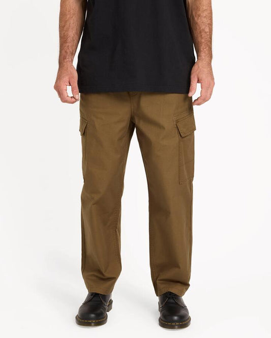 Image of a model wearing Pants. Productname: volcom Mens Billow Tapered Cargo Pants Sage Leaf - in Sage Leaf colour by brand - Volcom