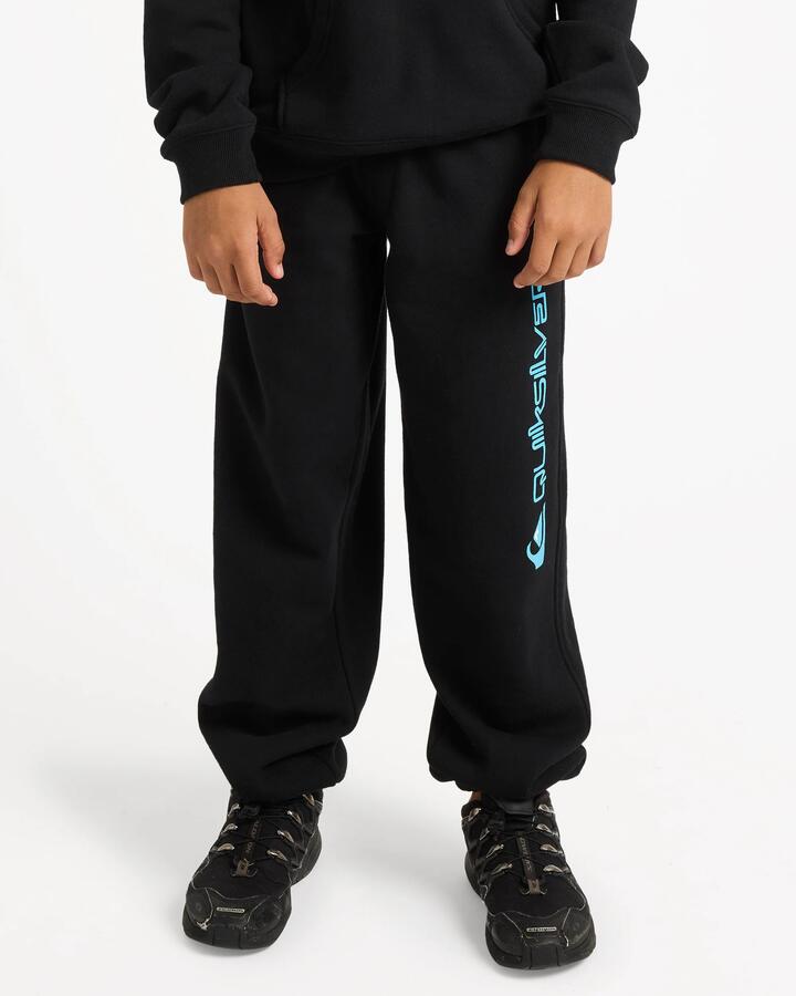 Image of a model wearing Pants. Product name - Quiksilver Boys 8-16 Screen Trackpants Black in Black colour by brand - Quiksilver