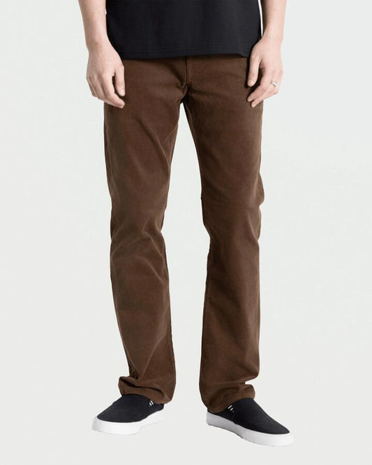 Image of a model wearing Pants. Productname: volcom Mens Solver 5 Pocket Pants Brown Stone - in Brown Stone colour by brand - Volcom