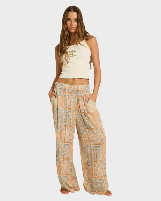 Image of a model wearing Pants. Product name - Billabong Womens Follow Me Printed Elastic Pants Multi in Multi colour by brand - Billabong