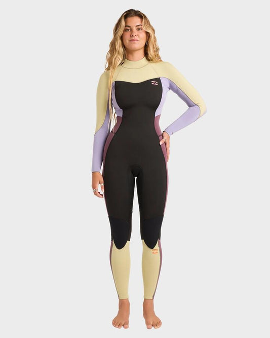 Image of a model wearing Tops. Product name - Billabong Womens 3/2Mm Synergy Back Zip Long Sleeve Fullsuit (Reshoot) Grey Violet in Grey Violet colour by brand - Billabong