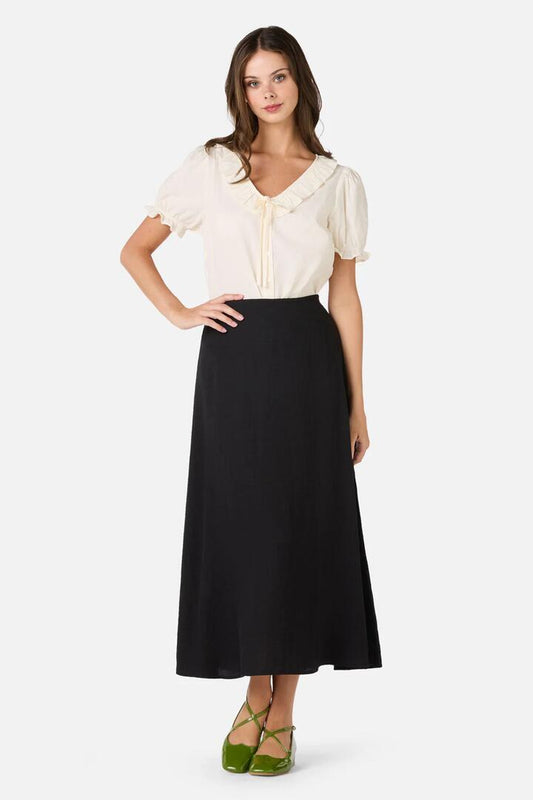 Image of a model wearing Skirts. Productname: Mindy A-Line Midi Skirt in Black colour by brand - Princess Highway