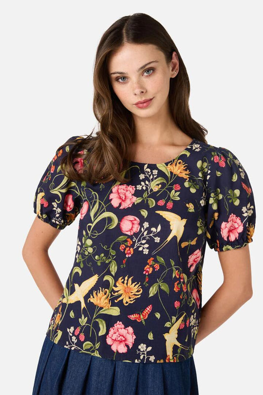 Image of a model wearing Tops. Productname: Whimsical Garden Sleeved Top in Navy colour by brand - Princess Highway