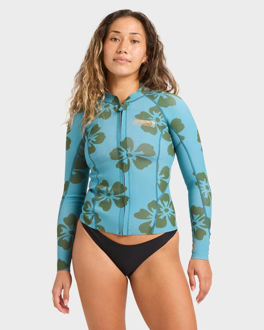 Image of a model wearing Tops. Product name - Billabong Womens 1/1 Peeky Long Sleeve Wetsuit Top Last Summer in Last Summer colour by brand - Billabong