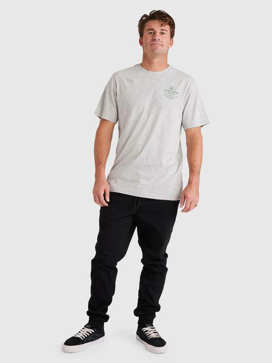 Image of a model wearing Pants. Productname: volcom Mens Road Trip Elastic Waist Pants Black - in Black colour by brand - Volcom