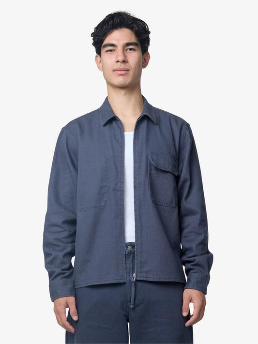 Image of a model wearing Outerwear. Productname: Article One Nino Washed Cotton Overshirt in Washed Azure colour by brand - Article One