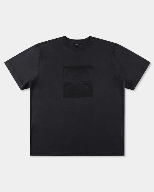 Image of a model wearing Tops. Productname: former Mens Crux Overdye T-Shirt Washed Black - in Washed Black colour by brand - Former