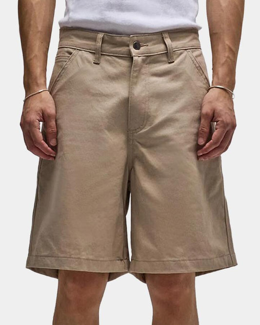 Image of a model wearing Shorts. Product name - Former Mens Reynolds 21" Walkshorts Stone in Stone colour by brand - Former