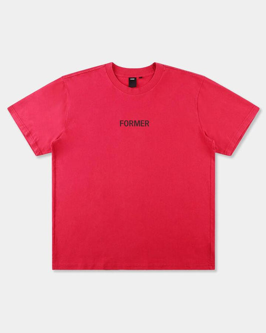 Image of a model wearing Tops. Productname: former Mens Legacy Overdye T-Shirt Cherry - in Cherry colour by brand - Former