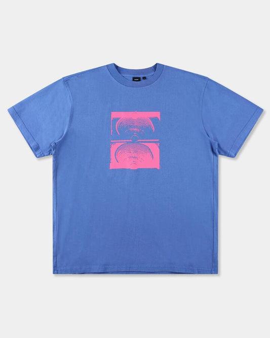 Image of a model wearing Tops. Productname: former Mens Crux Overdye T-Shirt Cobalt - in Cobalt colour by brand - Former