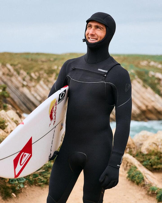 Image of a model wearing Tops. Productname: quiksilver Mens 5/4/3 Marathon Sessions Hooded Chest Zip Wetsuit Black - in Black colour by brand - Quiksilver