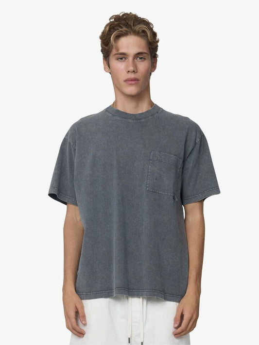 Image of a model wearing Tops. Productname: Article One Kit Tee in Black colour by brand - Article One