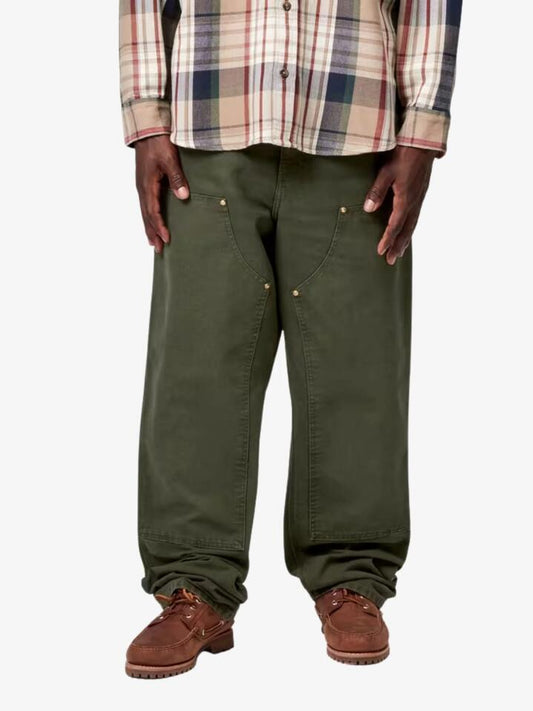 Image of a model wearing Pants. Productname: Carhartt Wip Double Knee Pant in Olive Stone Canvas colour by brand - Carhartt Wip