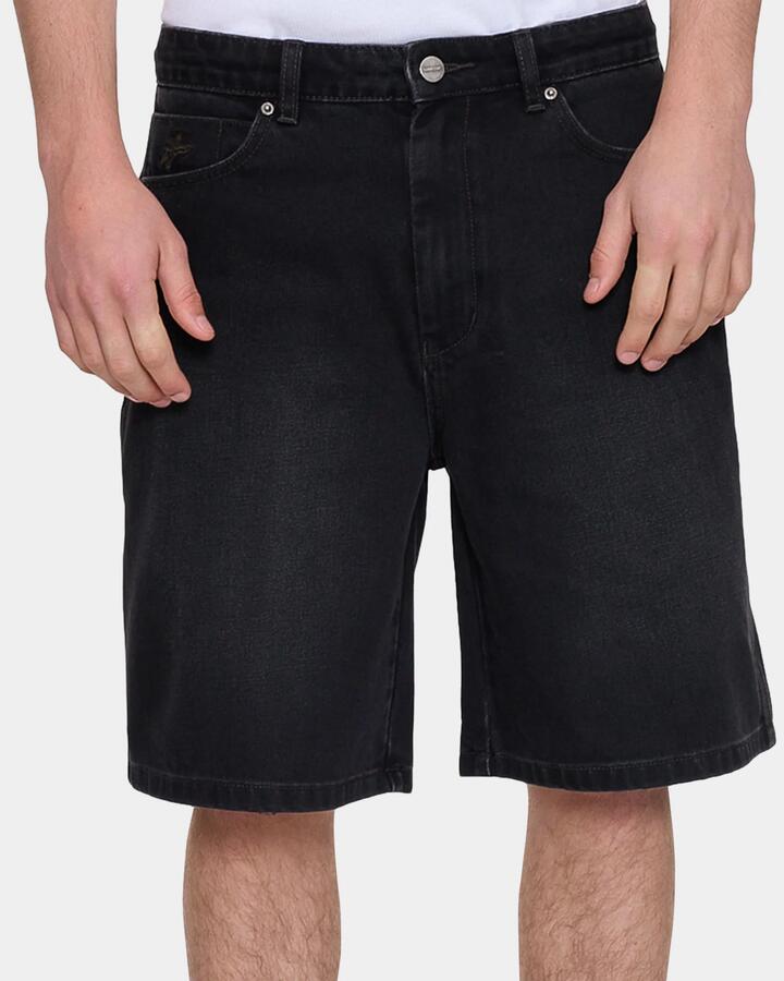 Image of a model wearing Shorts. Product name - Worship Mens On Leave Carpenter Denim Shorts Raven in Raven colour by brand - Worship