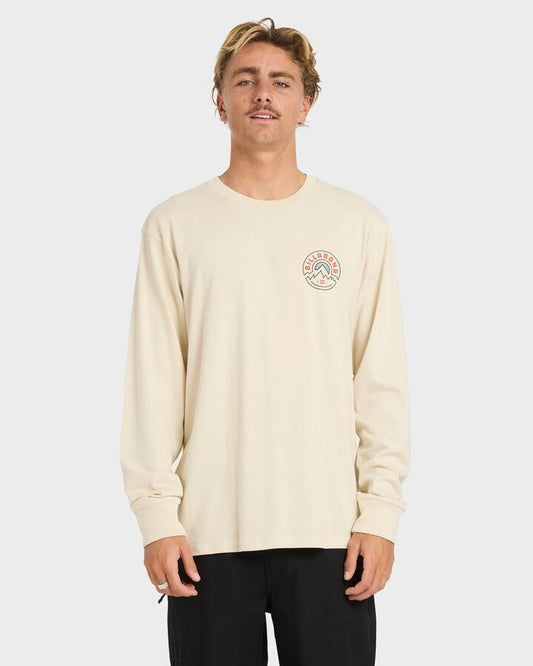 Image of a model wearing Tops. Productname: billabong Mens Rockies Adiv Premium Long Sleeve T-Shirt Oatmeal - in Oatmeal colour by brand - Billabong