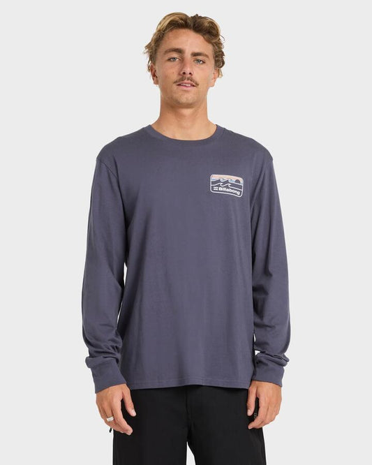 Image of a model wearing Tops. Product name - Billabong Mens Runner Premium Long Sleeve T-Shirt Graystone in Graystone colour by brand - Billabong