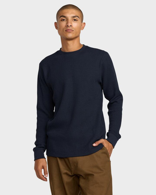 Image of a model wearing Tops. Product name - RVCA Mens Dayshift Thermal Long Sleeve T-Shirt Moody Blue in Moody Blue colour by brand - RVCA