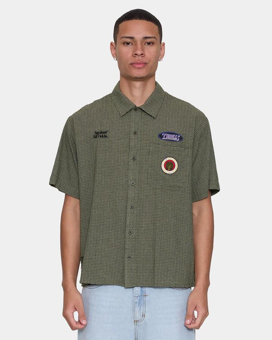 Image of a model wearing Tops. Productname: thrills Mens Against All Odds Cropped Short Sleeve Shirt Oil Green - in Oil Green colour by brand - Thrills