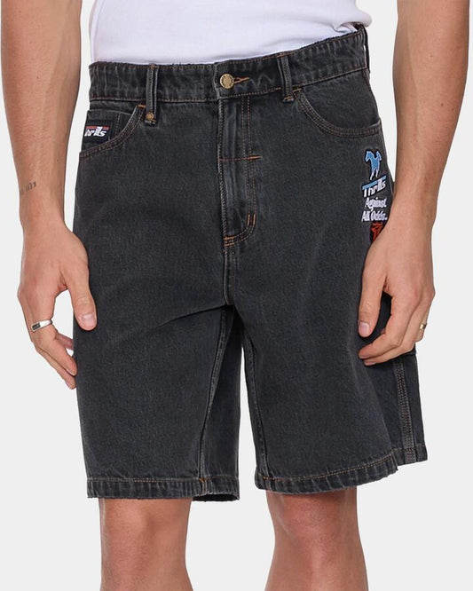 Image of a model wearing Shorts. Productname: thrills Mens Against All Odds Mid Slacker Relaxed Denim Shorts Ash Black - in Ash Black colour by brand - Thrills