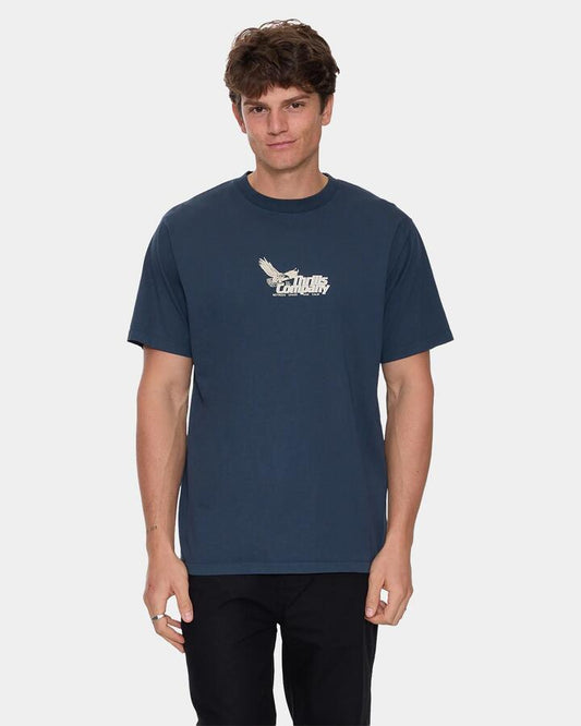 Image of a model wearing Tops. Productname: thrills Mens Between Chaos & Calm T-Shirt Federal Blue - in Federal Blue colour by brand - Thrills