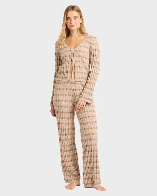 Image of a model wearing Pants. Productname: billabong Womens Bubble Tides Elastic Waist Knitted Pants Stone - in Stone colour by brand - Billabong