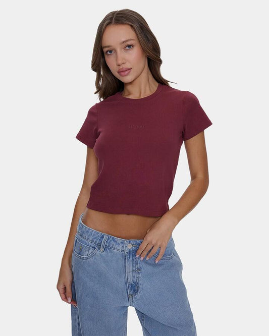 Image of a model wearing Tops. Productname: thrills Womens Minimal Thrills Mini T-Shirt New Maroon - in New Maroon colour by brand - Thrills