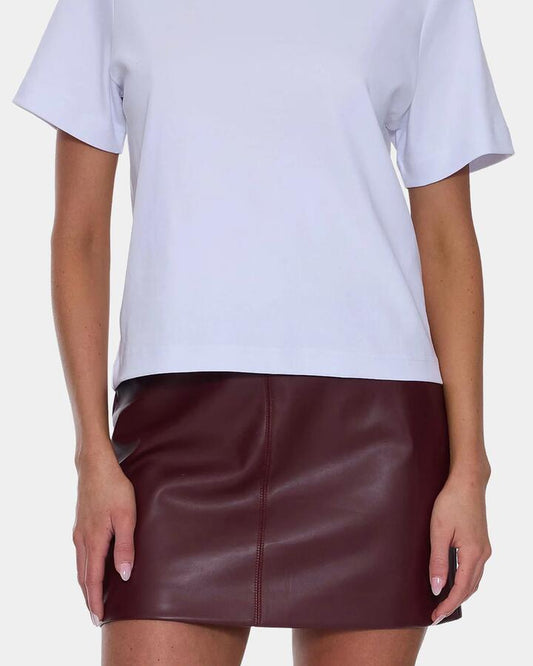 Image of a model wearing Skirts. Productname: thrills Womens Ethan Leather Mini Skirt New Maroon - in New Maroon colour by brand - Thrills