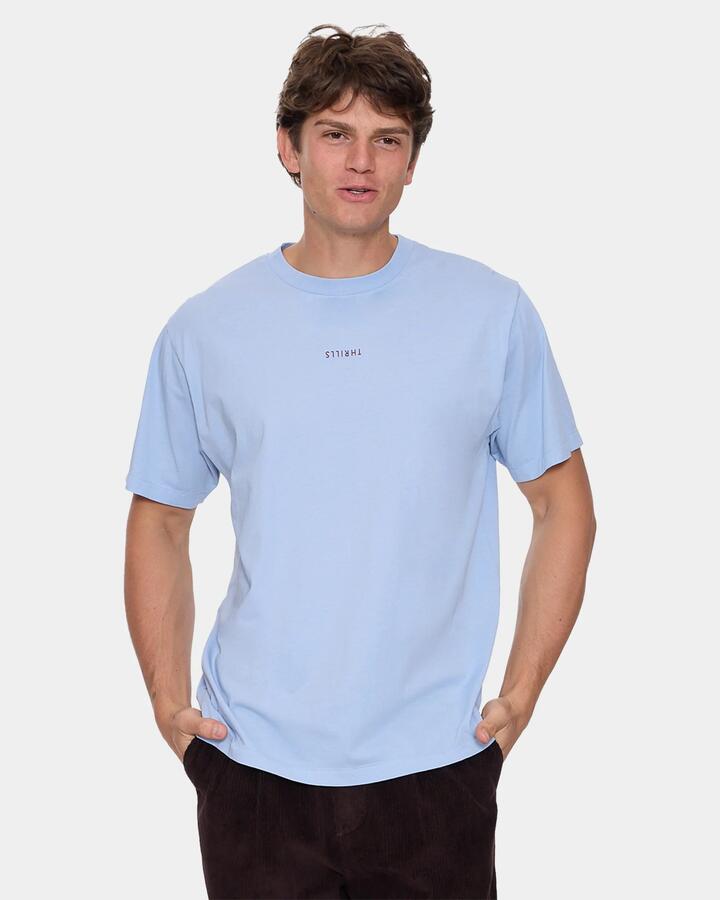 Image of a model wearing Tops. Productname: thrills Mens Minimal Thrills Merch Fit T-Shirt Placid Blue - in Placid Blue colour by brand - Thrills