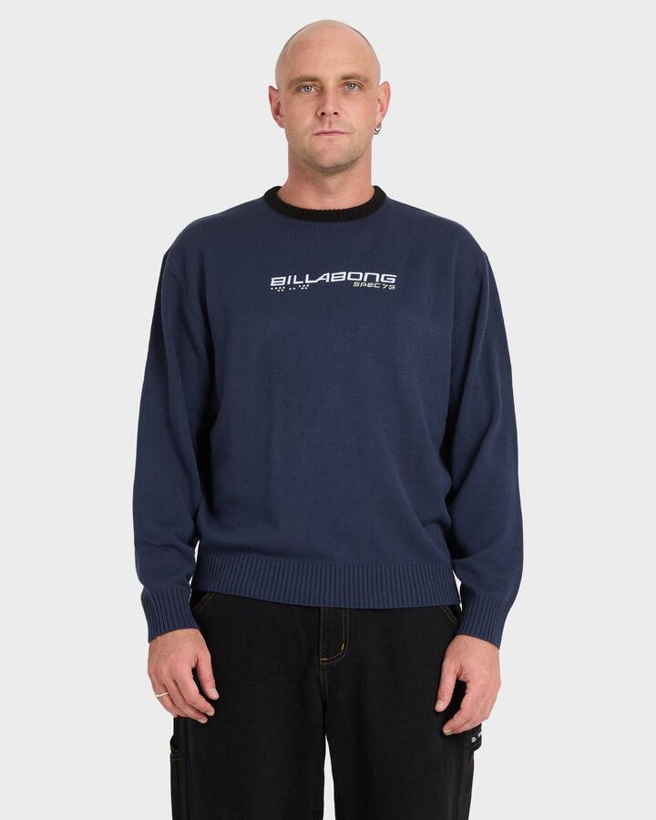 Image of a model wearing Outerwear. Product name - Billabong Mens Spec 73 Knit Sweatshirt Dusty Navy in Dusty Navy colour by brand - Billabong