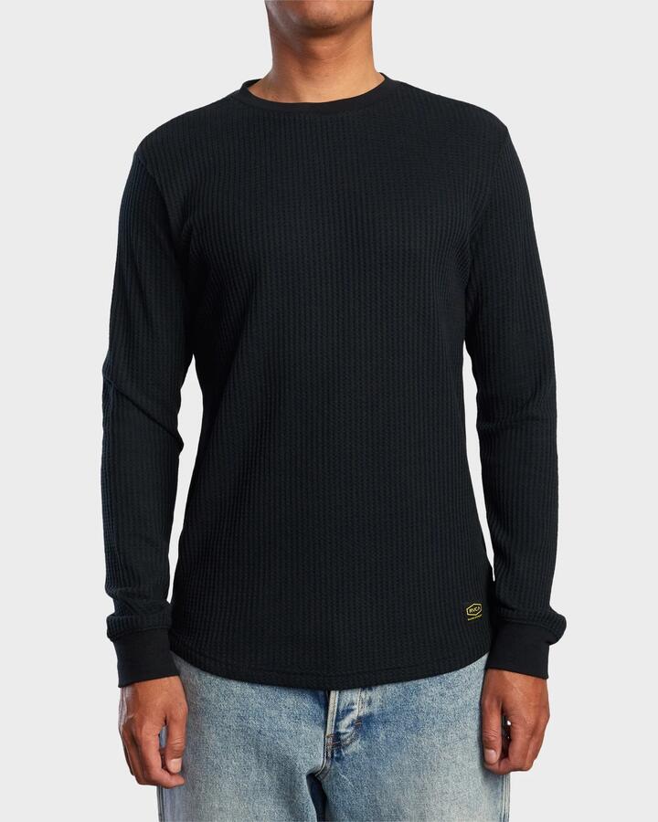 Image of a model wearing Tops. Productname: rvca Mens Dayshift Thermal Long Sleeve T-Shirt Black - in Black colour by brand - Rvca