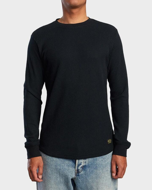 Image of a model wearing Tops. Productname: rvca Mens Dayshift Thermal Long Sleeve T-Shirt Black - in Black colour by brand - Rvca