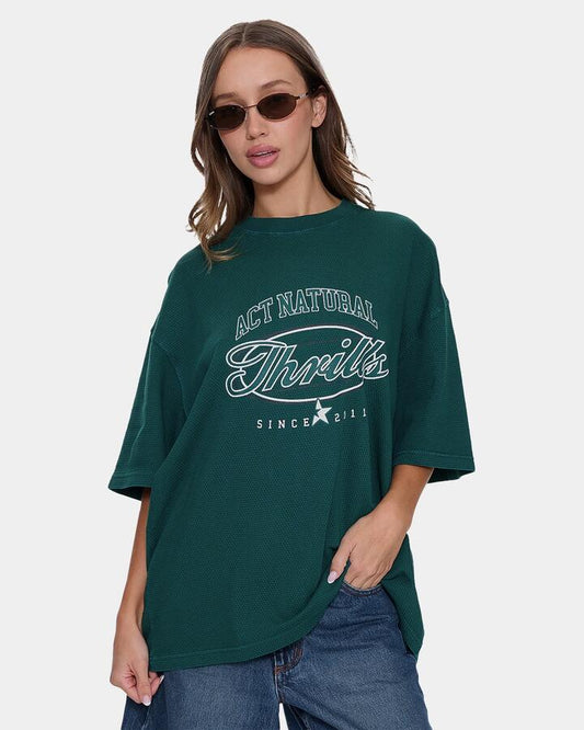 Image of a model wearing Tops. Productname: thrills Womens Standard Issue Waffle Oversized T-Shirt Varsity Green - in Varsity Green colour by brand - Thrills