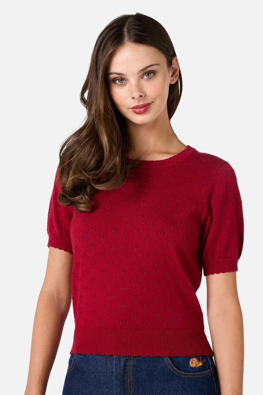Image of a model wearing Tops. Productname: Amora Heart Knit Top in Red colour by brand - Princess Highway