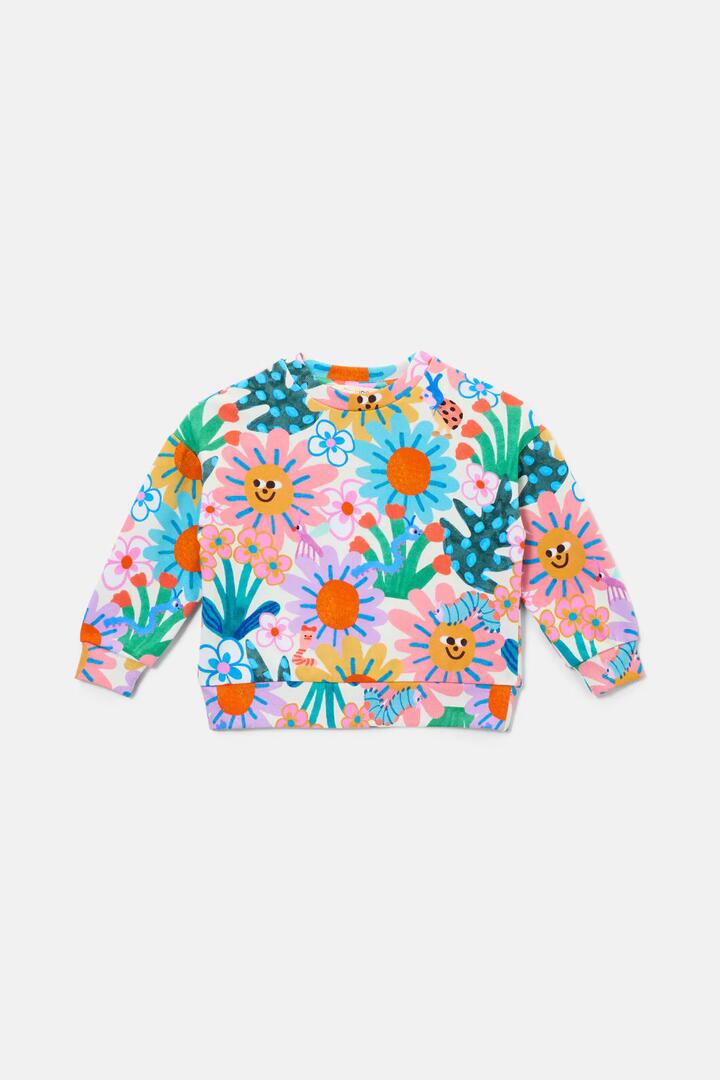 Image of a model wearing Outerwear. Product name - Hyper Floral Kids Sweater in Multi colour by brand - Gorman