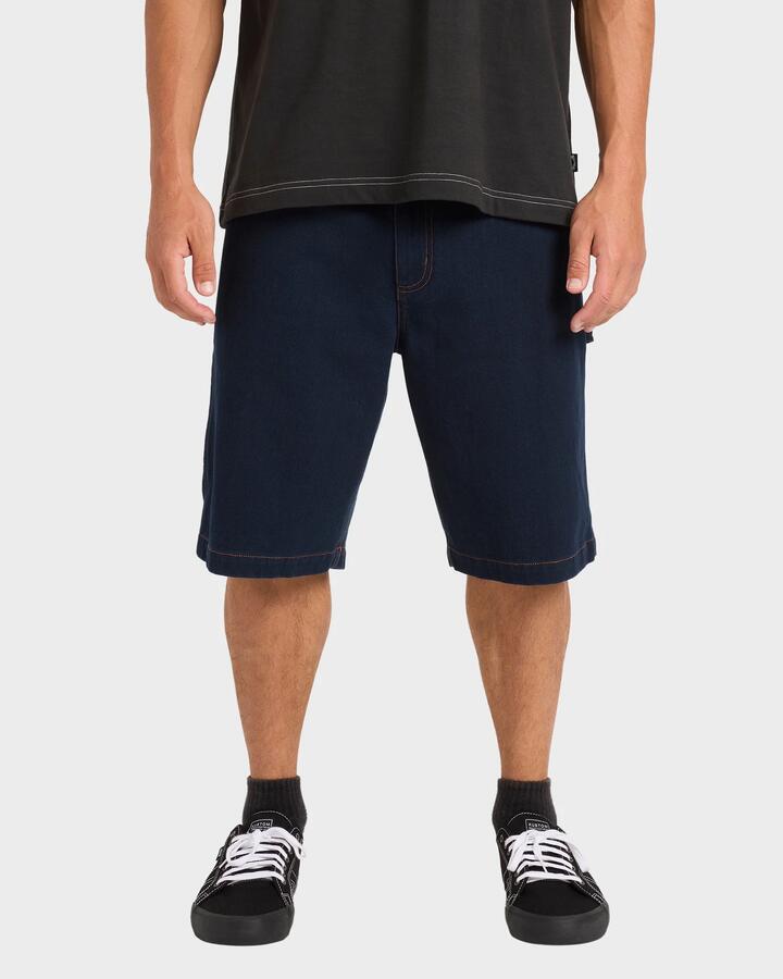 Image of a model wearing Uniforms & Workwear. Product name - Billabong Mens Bad Dog Workwear 21" Walkshorts Navy - in Navy colour by brand - Billabong