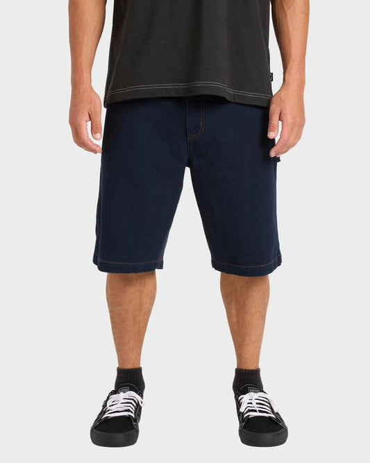 Image of a model wearing Uniforms & Workwear. Product name - Billabong Mens Bad Dog Workwear 21" Walkshorts Navy - in Navy colour by brand - Billabong