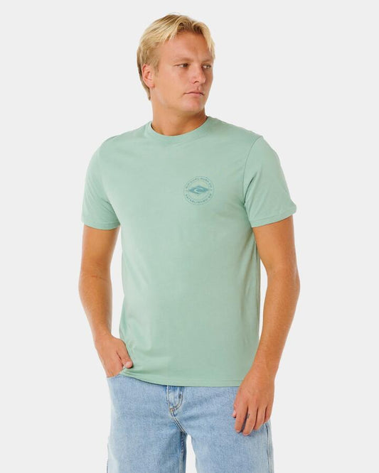 Image of a model wearing Tops. Productname: rip Curl Mens Staple T-Shirt Aloe - in Aloe colour by brand - rip Curl