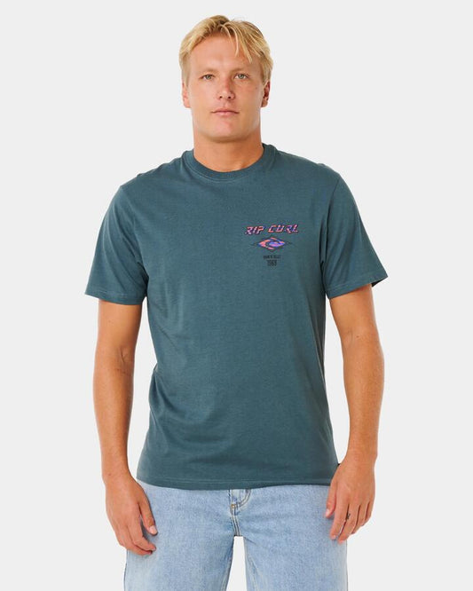 Image of a model wearing Tops. Productname: rip Curl Mens Fade Out Icon T-Shirt Pine Night - in Pine Night colour by brand - rip Curl
