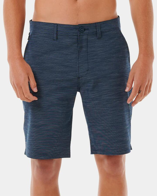 Image of a model wearing Shorts. Productname: rip Curl Mens Jackson 20" Hybrid Shorts Dark Navy - in Dark Navy colour by brand - rip Curl