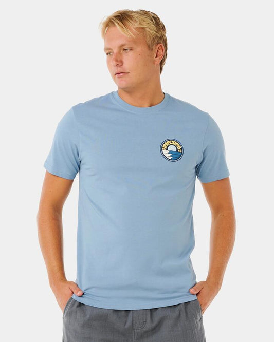 Image of a model wearing Tops. Productname: rip Curl Mens Pacific Rinse Stacked T-Shirt Faded Denim - in Faded Denim colour by brand - rip Curl