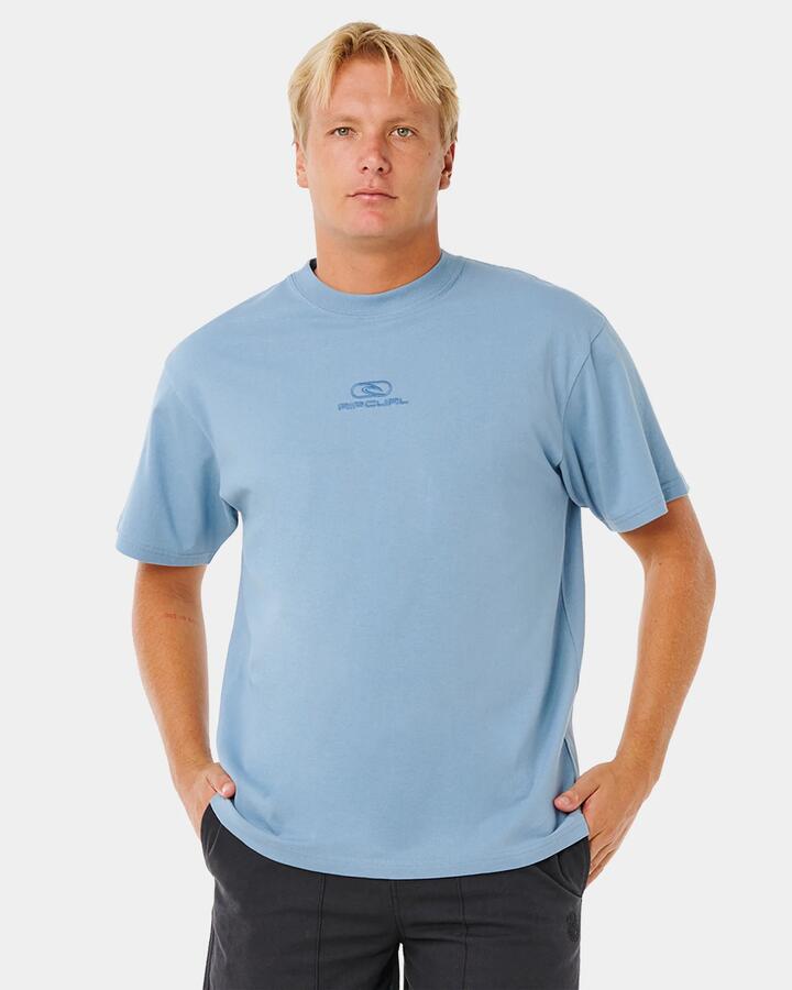 Image of a model wearing Tops. Productname: rip Curl Mens Pill Icon T-Shirt Faded Denim - in Faded Denim colour by brand - rip Curl