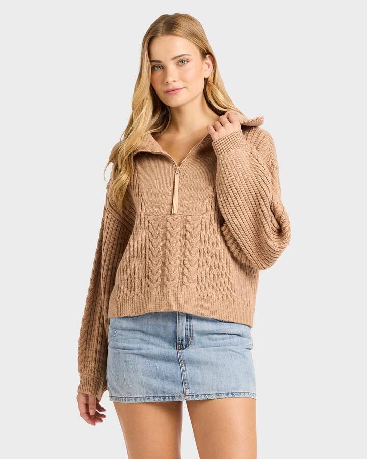 Image of a model wearing Outerwear. Productname: billabong Womens Sun Zippy V-Neck Sweatshirt Truffle - in Truffle colour by brand - Billabong