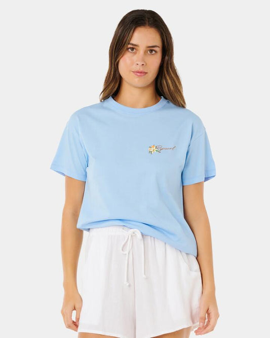 Image of a model wearing Tops. Productname: rip Curl Womens Poolside Relaxed T-Shirt Light Blue - in Light Blue colour by brand - rip Curl